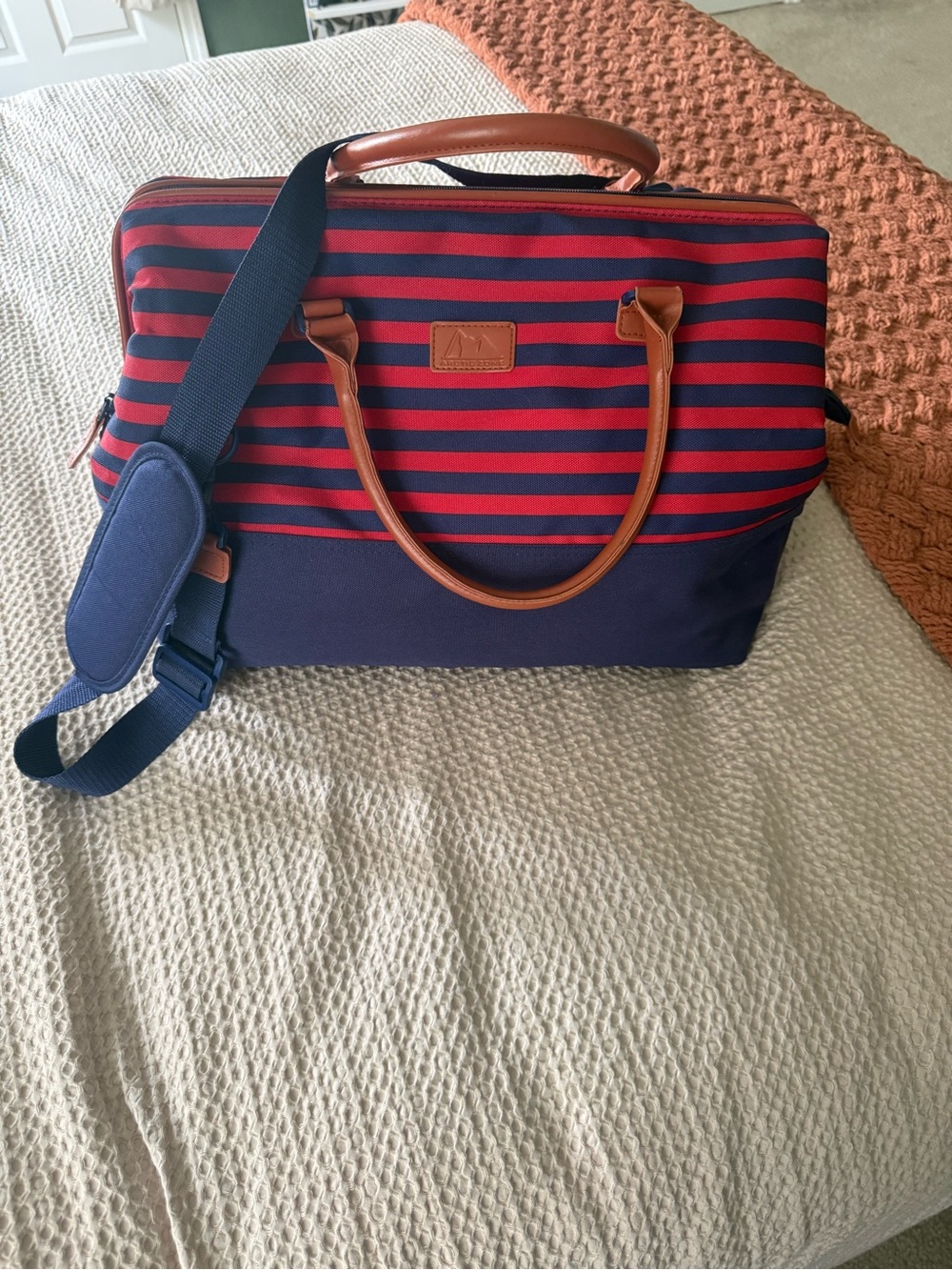 Navy and Red Striped insulated Duffel Bag with Tan Handles